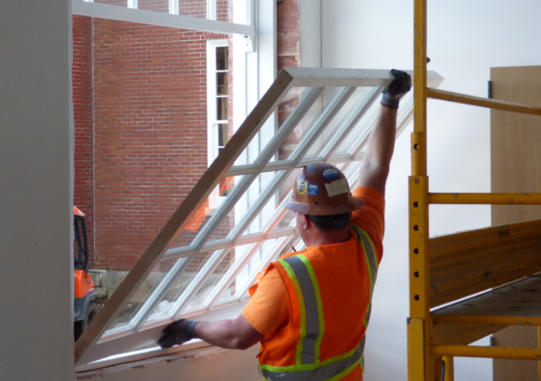 taylor-installing-sash-768×542
